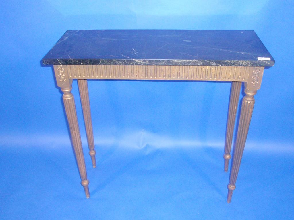 Appraisal: A thC gilt finished console table with reeded legs and