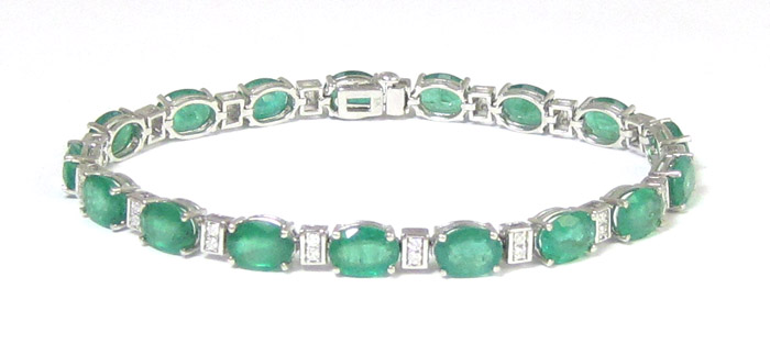 Appraisal: EMERALD DIAMOND AND TEN KARAT WHITE GOLD LINE BRACELET set