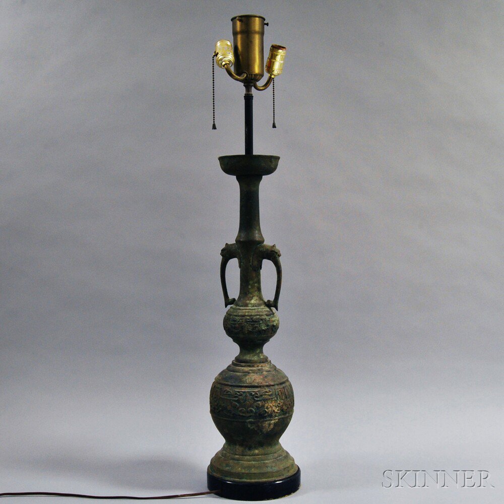 Appraisal: Archaic-style Metal Vase mounted and electrified surface patina ht in