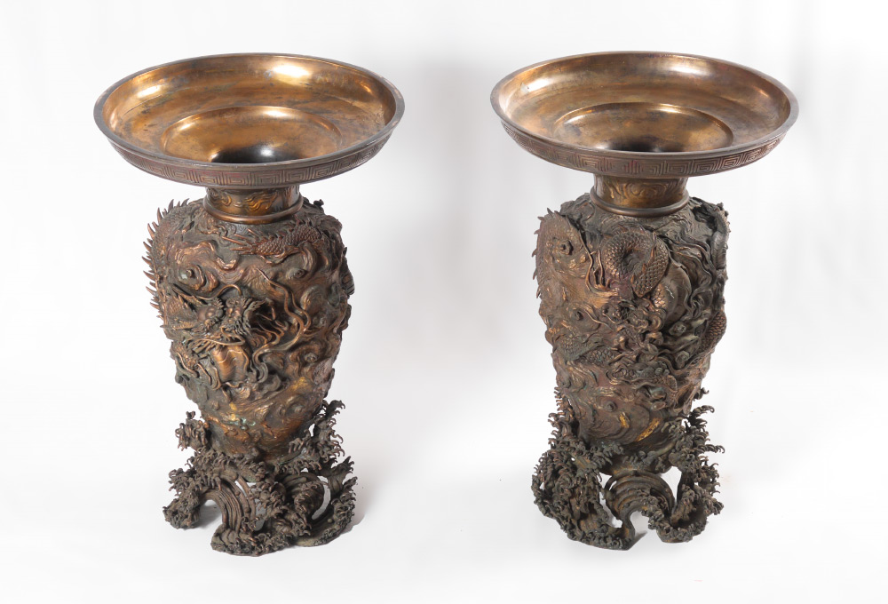 Appraisal: PAIR BRONZE PALACE VASES WITH ONYX TOPS High relief Japanese