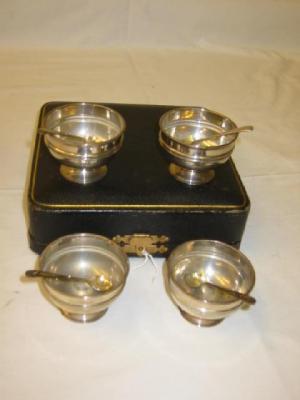 Appraisal: A SET OF FOUR SALTS of circular pedestal form with