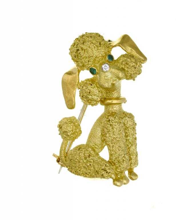 Appraisal: AN EMERALD AND DIAMOND POODLE BROOCH of matt and polished