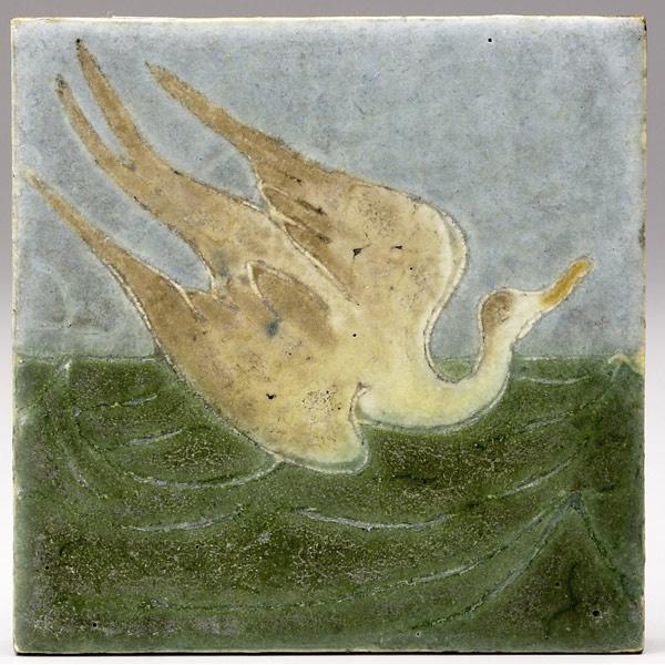 Appraisal: GRUEBY Tile decorated in cuenca with a bird swooping down