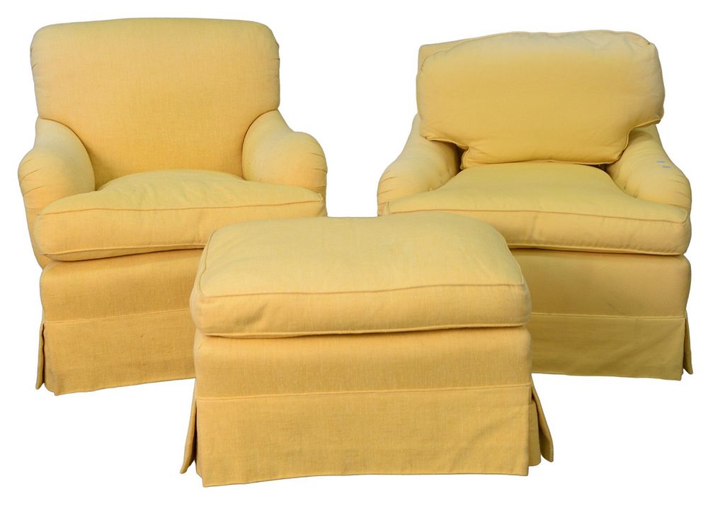 Appraisal: Two Easy Chairs in custom yellow upholstery one with loose