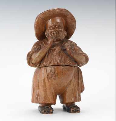 Appraisal: A Monochrome Full Figure Tobacco Jar Of Rotund Farmer Unmarked