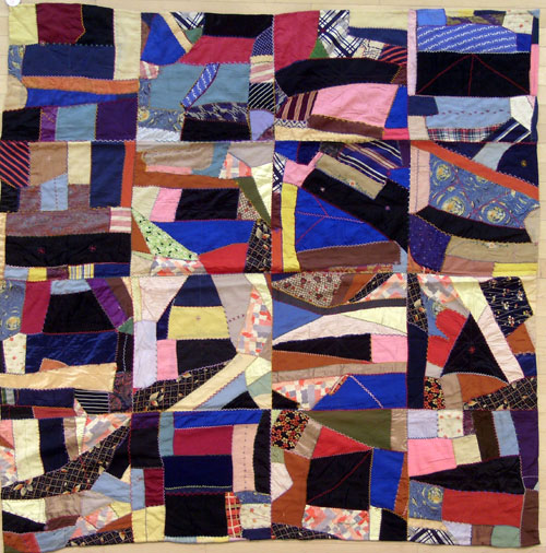 Appraisal: Victorian pieced cotton and wool crazy quilt inscribed Bertha B