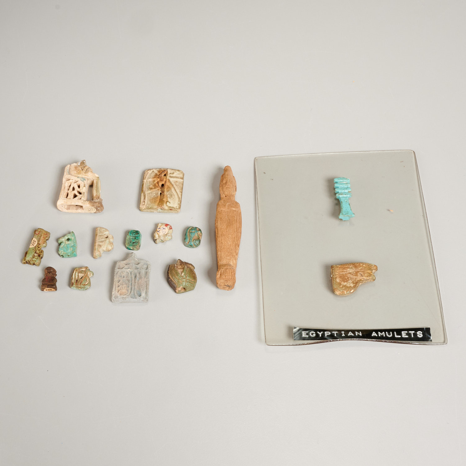 Appraisal: ANCIENT EGYPTIAN AMULETS EX-MUSEUM Possibly c BC incl faience clay