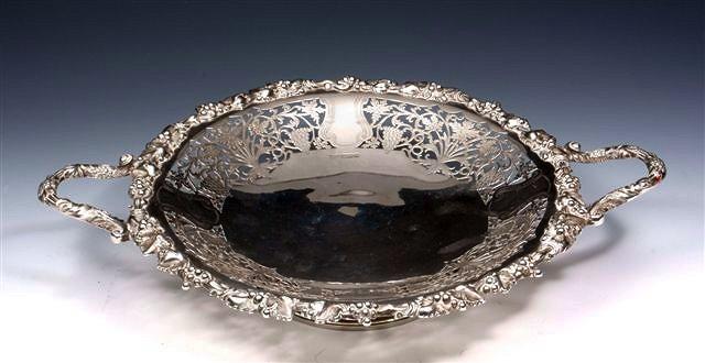 Appraisal: A SILVER TWO HANDLED FRUIT BASKET with pierced open fretwork