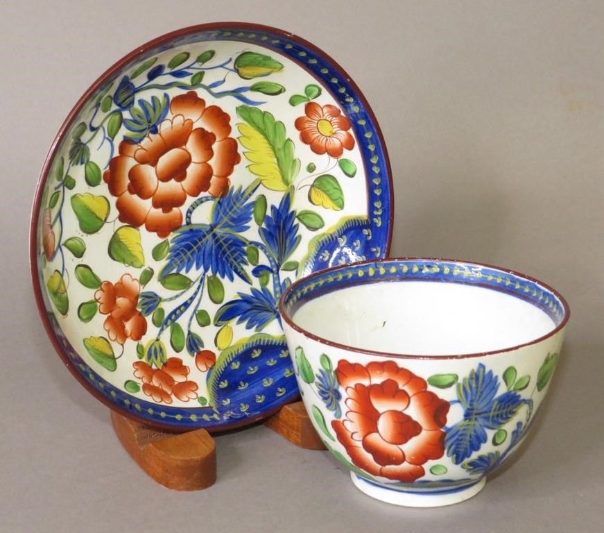 Appraisal: PEARLWARE CUP AND SAUCER GAUDY DUTCH CARNATION PAca pearlware handleless