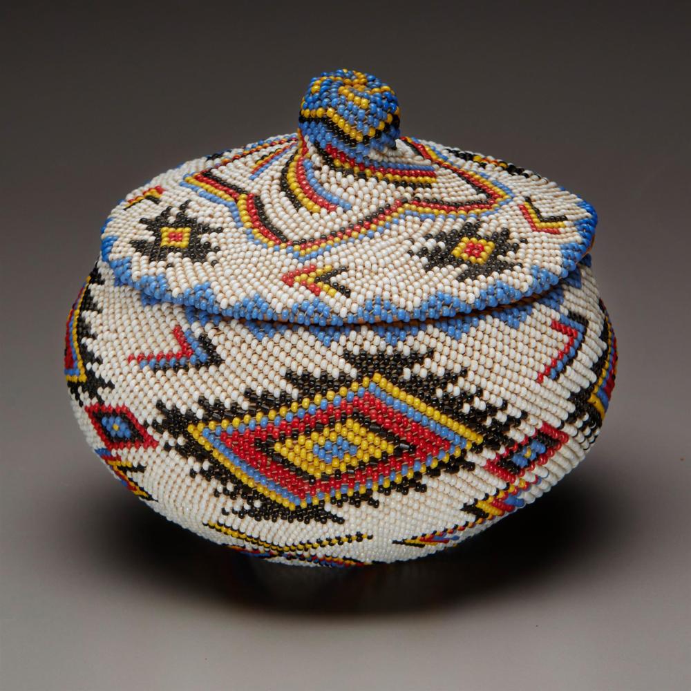 Appraisal: A polychrome Washoe beaded and lidded basket Mid- th Century