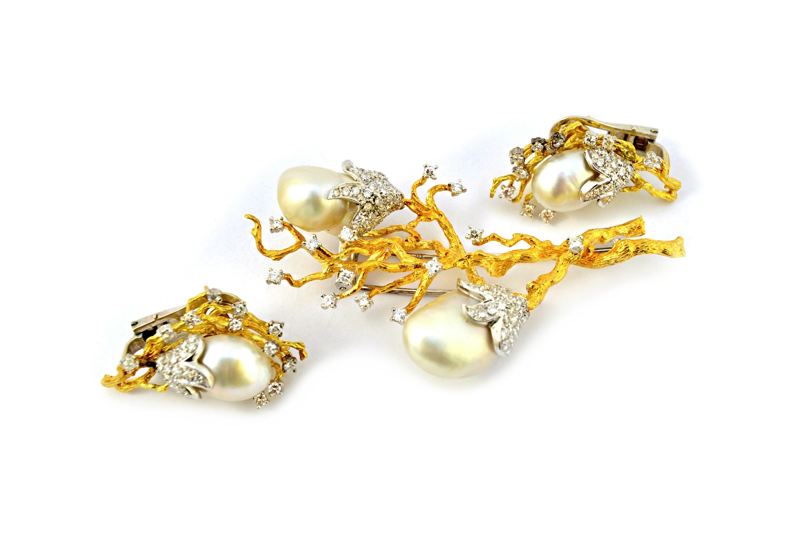 Appraisal: A gold diamond and cultured pearl set brooch in a