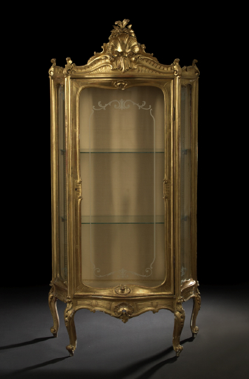 Appraisal: Louis XV-Style Giltwood Vitrine early th century the elaborately modeled