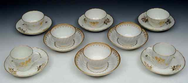 Appraisal: AN ENGLISH POSSIBLY WORCESTER WRYTHEN FLUTED PAIR OF COFFEE CUPS