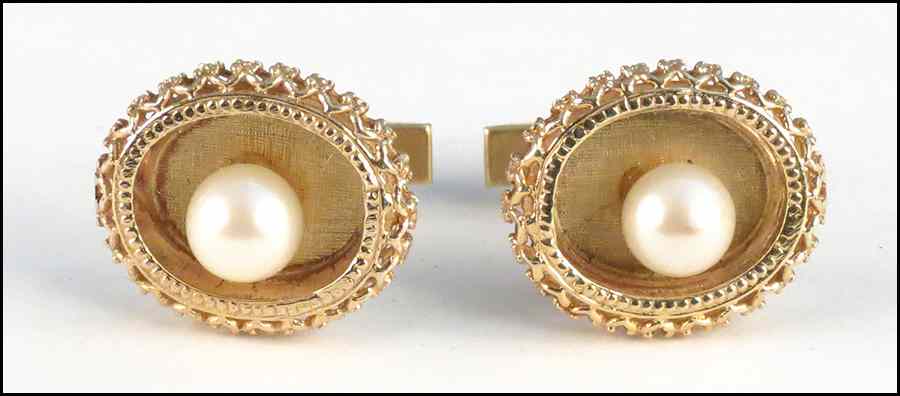 Appraisal: PAIR OF PEARL AND KARAT YELLOW GOLD CUFFLINKS Pearls are