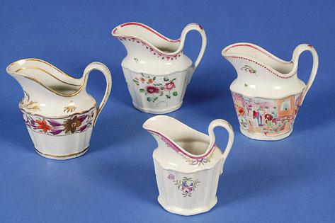 Appraisal: A NEW HALL CREAM JUG pattern of helmet shape highlighted