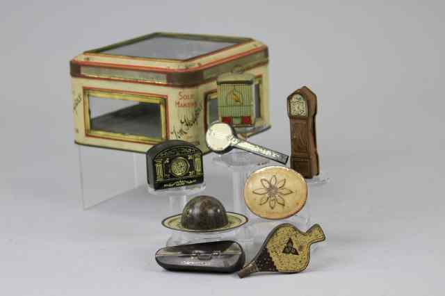 Appraisal: EIGHT ROWNTREE MINIATURE NOVELTY TINS Lithographed tinplate comprising a Christmas