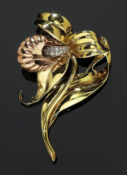 Appraisal: GOLD AND DIAMOND CLIP BROOCH s Yellow and red gold