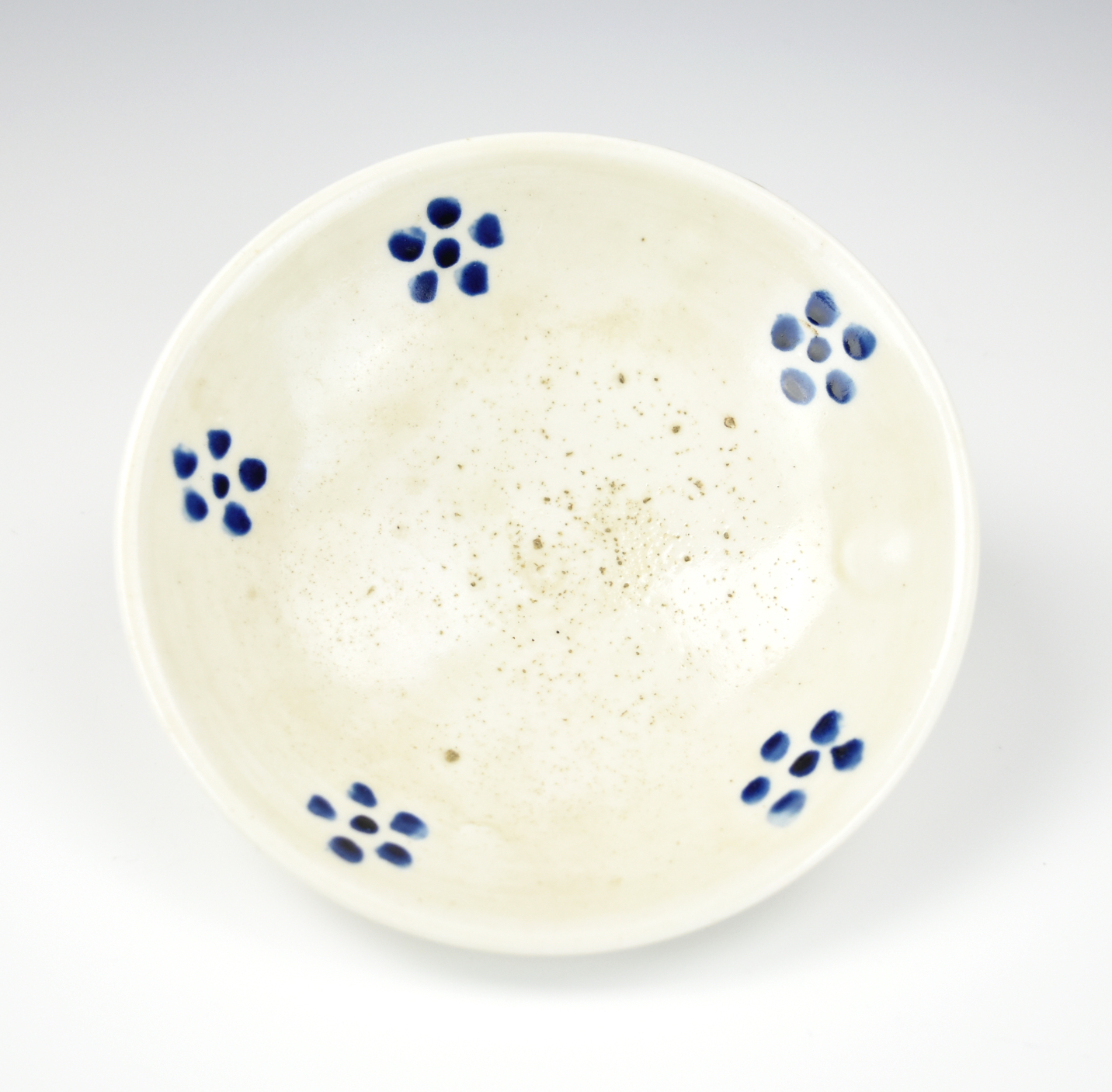 Appraisal: CHINESE WHITE GLAZED XING WARE BOWL W BLUE FLOWER of