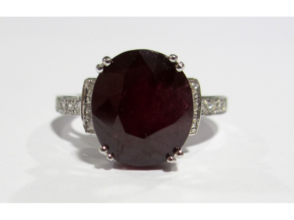 Appraisal: A ruby and diamond ring the large oval cushion cut