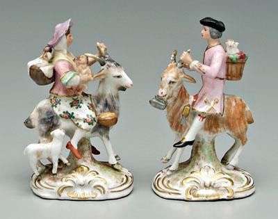 Appraisal: Pair French porcelain figurines tailor and woman riding goats man