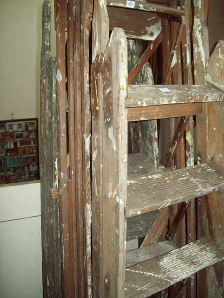 Appraisal: THREE ANTIQUE WOODEN LADDERS