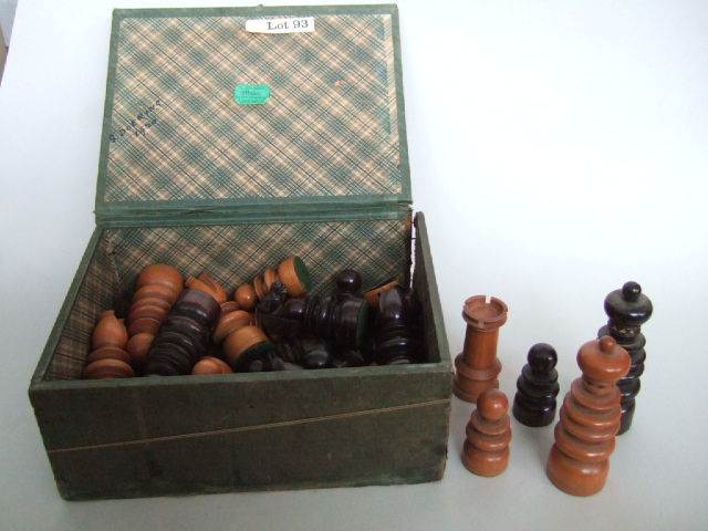 Appraisal: A Victorian stained boxwood chess set together with an oak