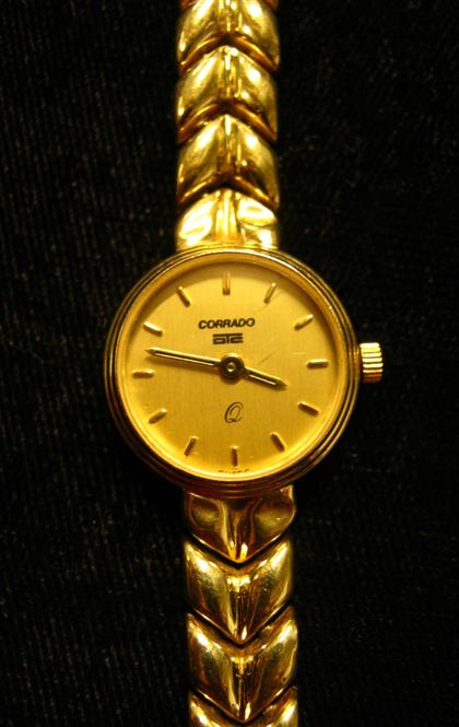 Appraisal: karat yellow gold wristwatch CorradoCircular case gold toned face with