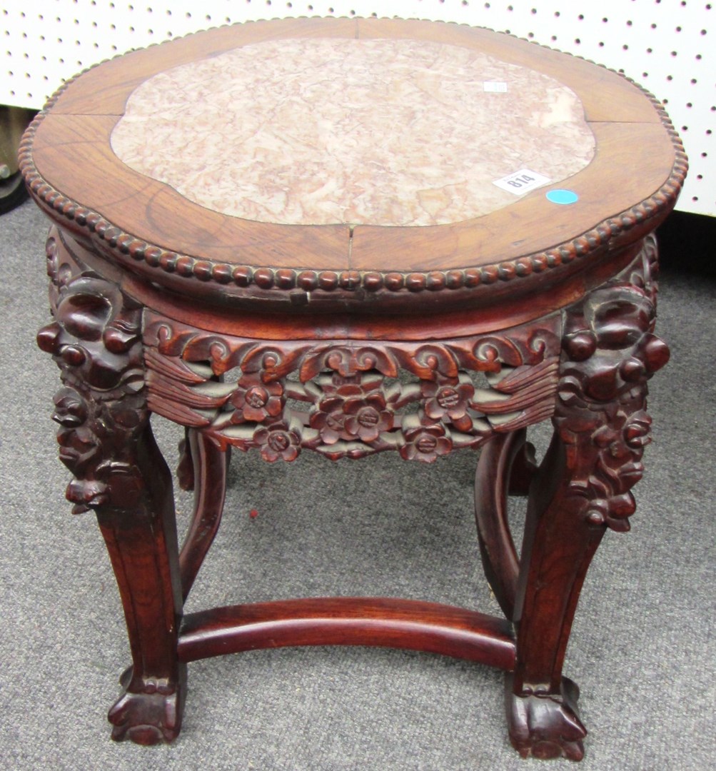 Appraisal: A late th century Chinese rosewood low jardiniere stand with