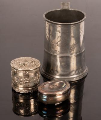 Appraisal: A Chinese white metal box and cover of cylinder-shape decorated