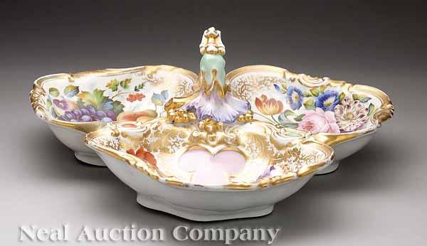 Appraisal: A Large Continental Porcelain Tripartite Dish the deep lobed wells