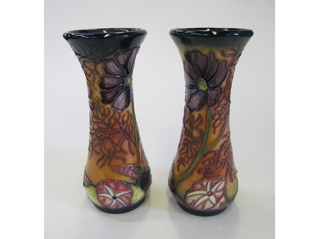 Appraisal: Pair of Moorcroft 'Cosmos' pattern vases cms high