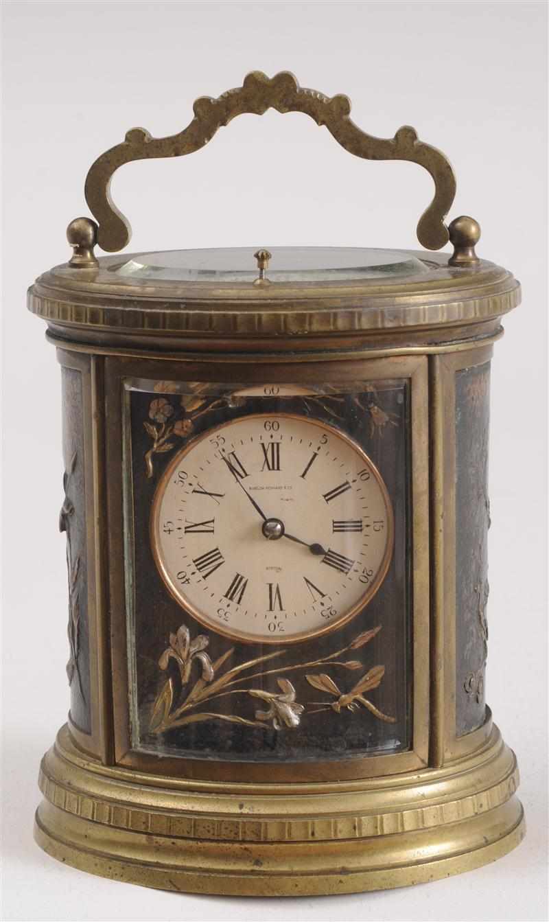 Appraisal: FRENCH JAPONAISE MIXED METAL AND BRASS CARRIAGE CLOCK Retailed by