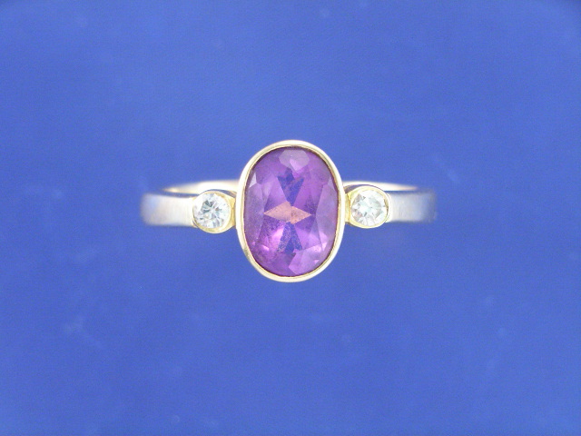 Appraisal: A ct gold amethyst and two diamond set dress ring