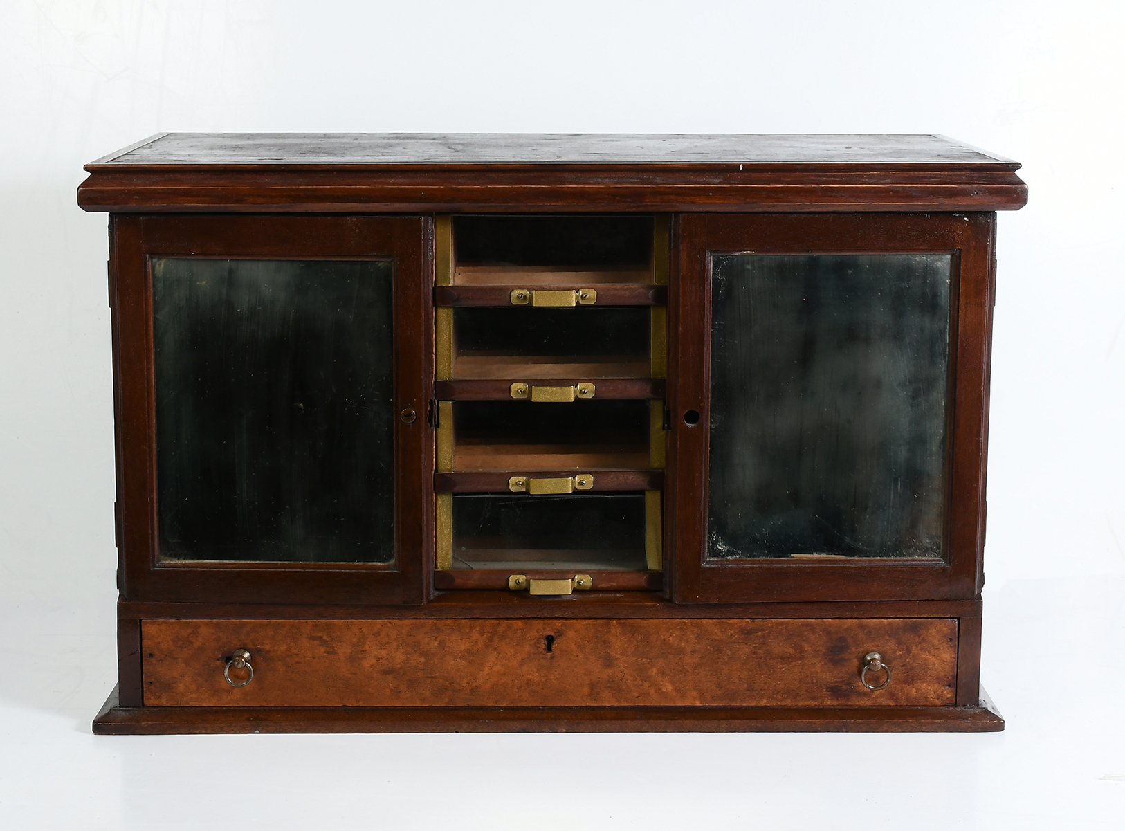 Appraisal: LEONARD CO SILK SPOOL CABINET Having glass front drawers for