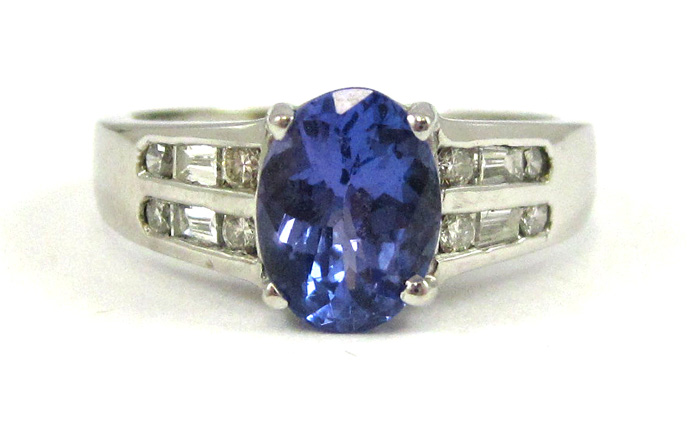 Appraisal: TANZANITE DIAMOND AND FOURTEEN KARAT WHITE GOLD RING four round-cut