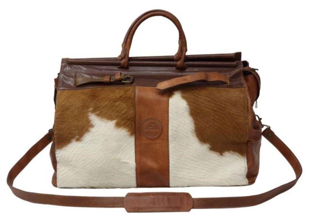 Appraisal: B S Trading Company travel bag in brown leather with