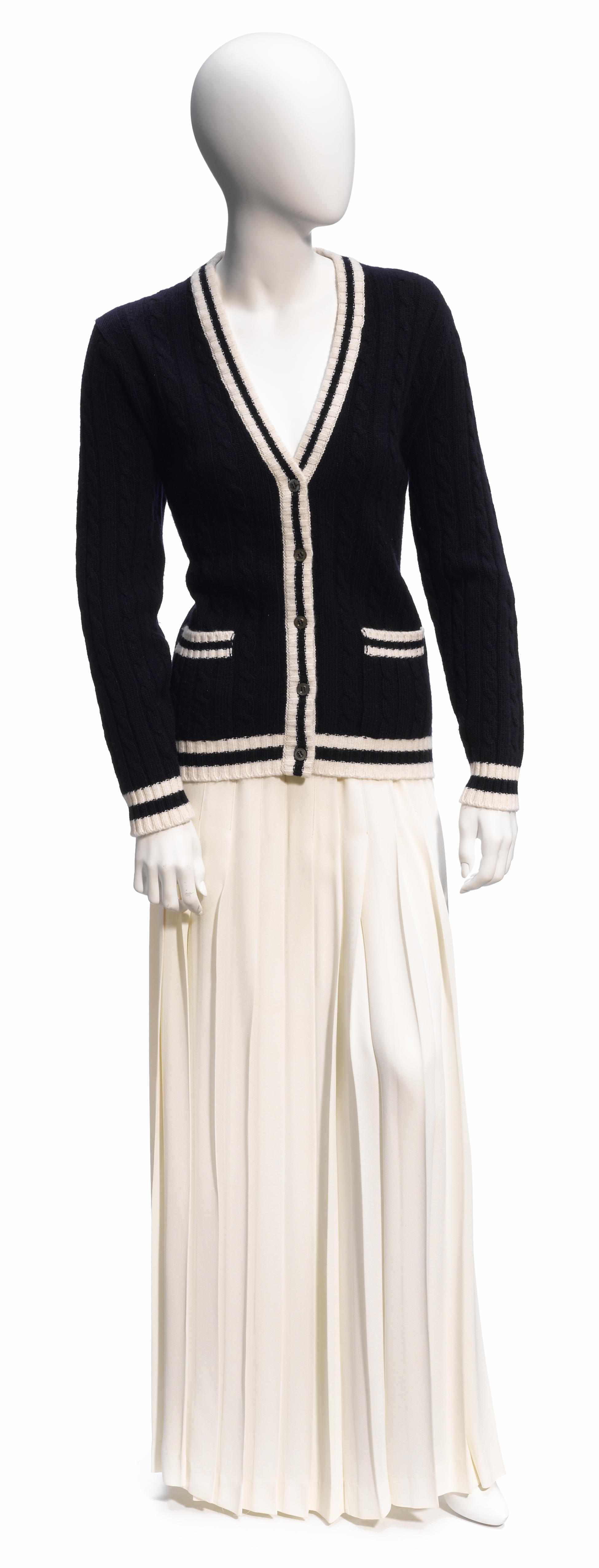 Appraisal: An Yves St Laurent navy and white cardigan sweater size