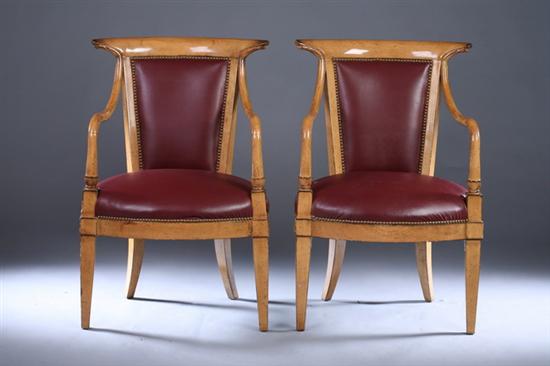 Appraisal: PAIR FRENCH EMPIRE STYLE SATINWOOD FAUTEUILS th century with nailed