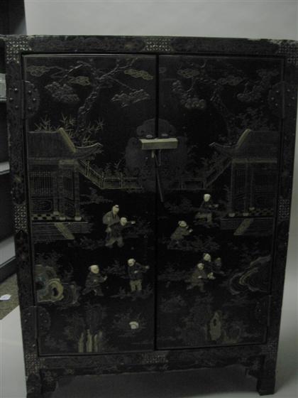 Appraisal: Chinese lacquer applied stone and ivory cabinet qing dynasty Of