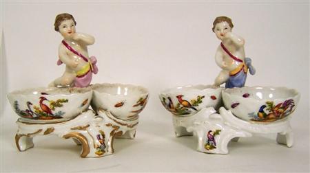 Appraisal: A pair of late th century Berlin figural double salts