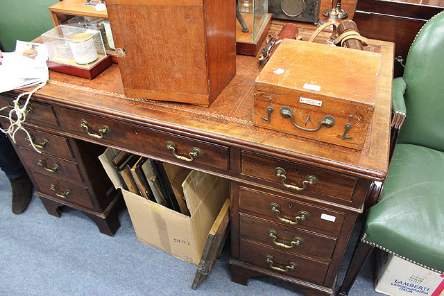 Appraisal: A PEDESTAL DESK with brown leather inset top cm wide