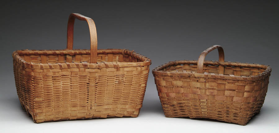 Appraisal: TWO RECTANGULAR HANDLED BASKETS Tight weave basket has D-shaped carved