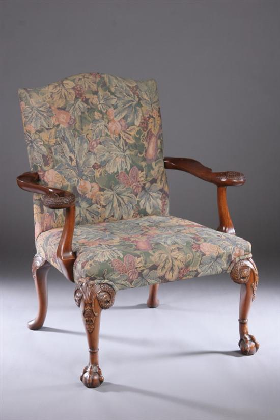 Appraisal: AMERICAN CHIPPENDALE-STYLE MAHOGANY OPEN ARMCHAIR Late th century With well