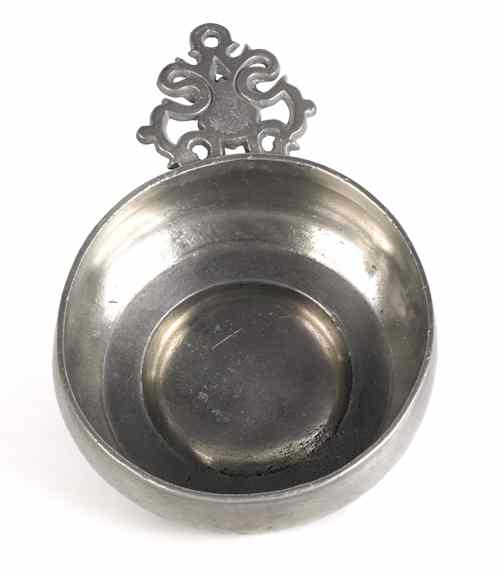 Appraisal: Hartford Connecticut pewter porringer ca bearing the touch of Samuel