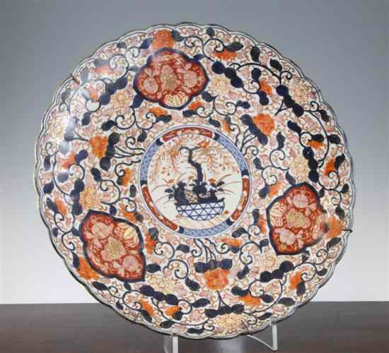 Appraisal: A Japanese Imari scalloped charger Meiji period - the centre