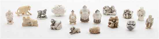 Appraisal: A Collection of Seventeen Carved Ivory Netsuke of various forms