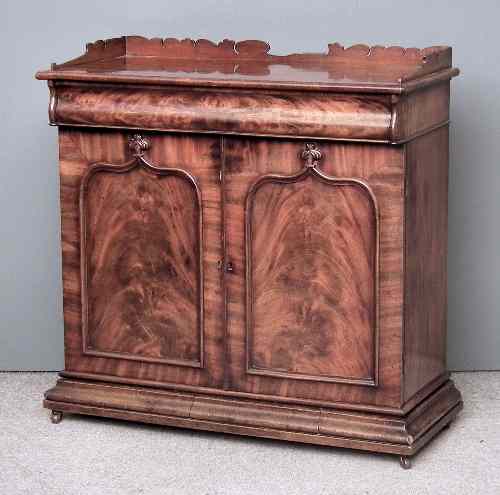 Appraisal: A Victorian figured mahogany tray top chiffonier fitted cushion moulded