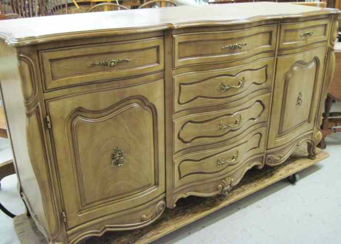 Appraisal: FRENCH PROVINCIAL STYLE BUFFET American mid- th century the serpentine