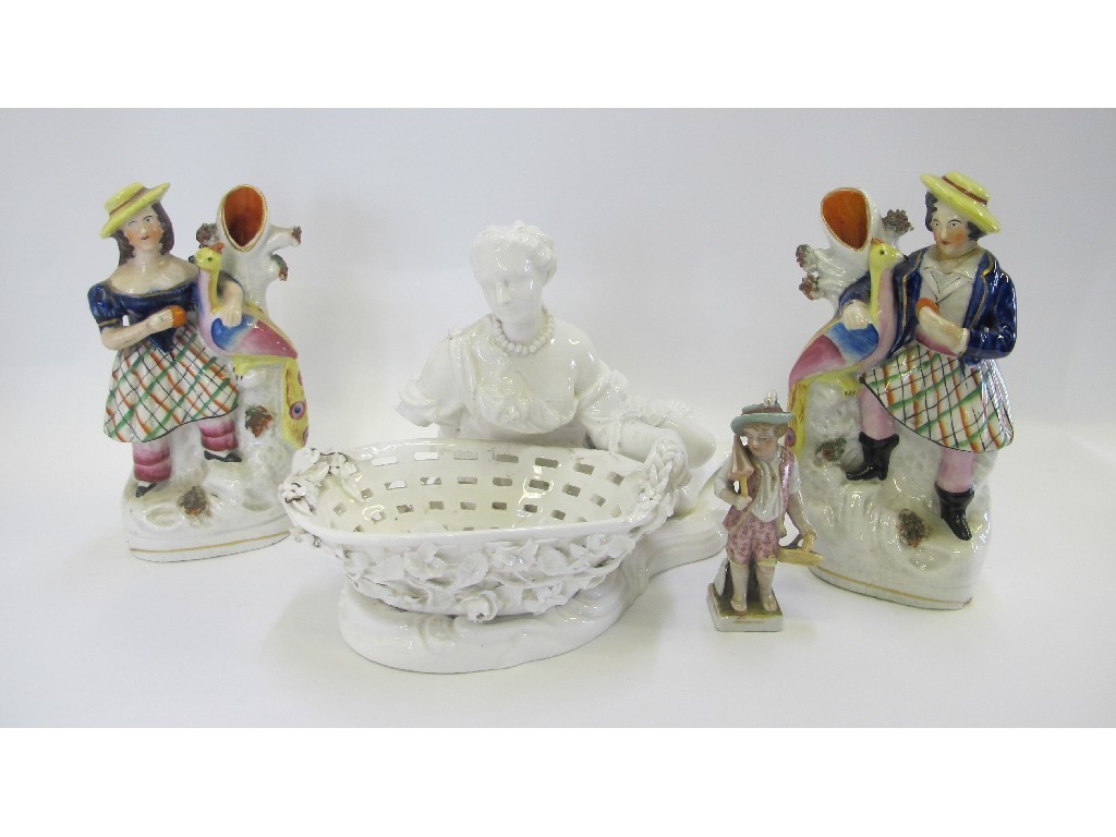 Appraisal: Continental white glazed figural basket pair of Staffordshire spill vases