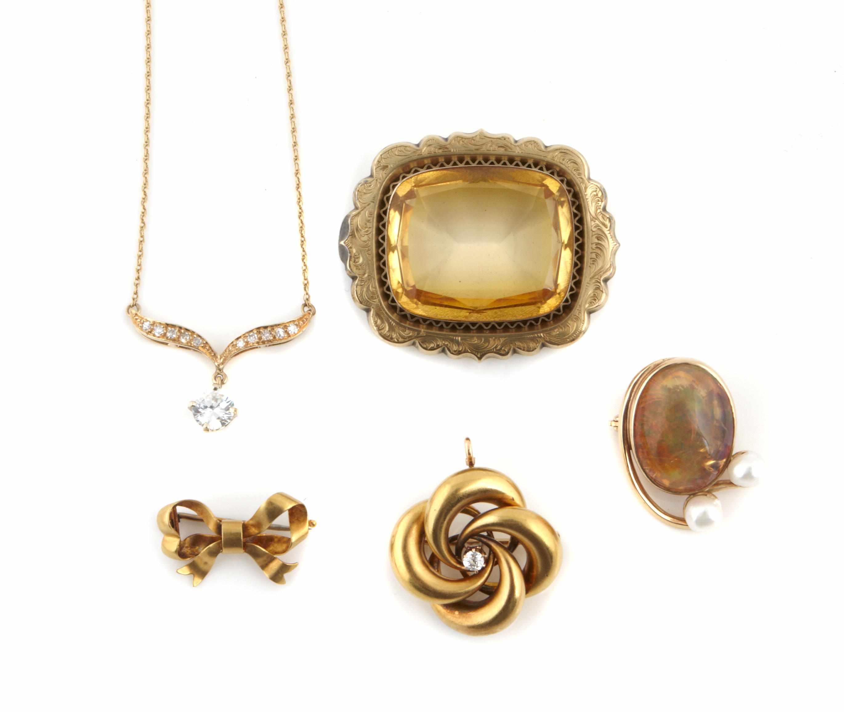 Appraisal: A group of gem-set gold and white gold jewelry including